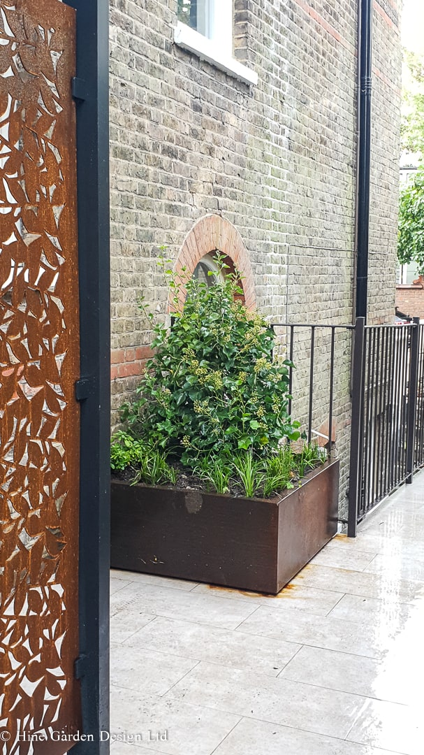 corten screens and planters in Hampstead Garden Design