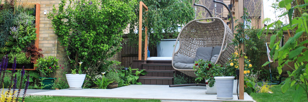 garden after image with pergola, wall and seating