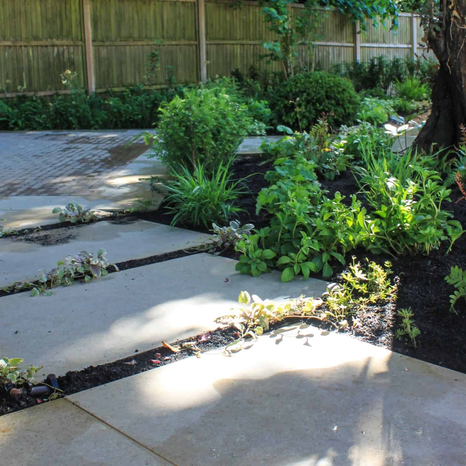 English country garden design brick walls and seating 