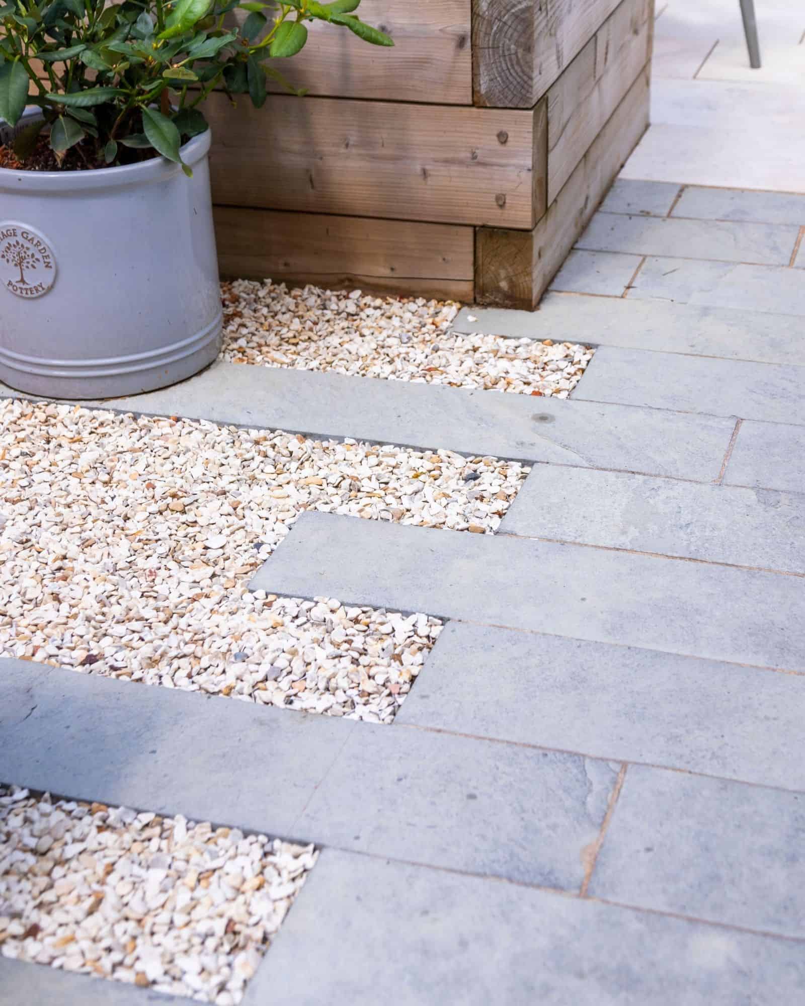 garden spaces created using raised bends and landscaping materials