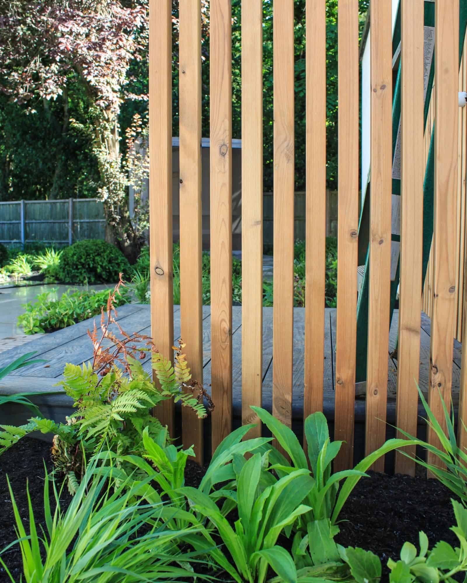English country garden design brick walls and seating 
