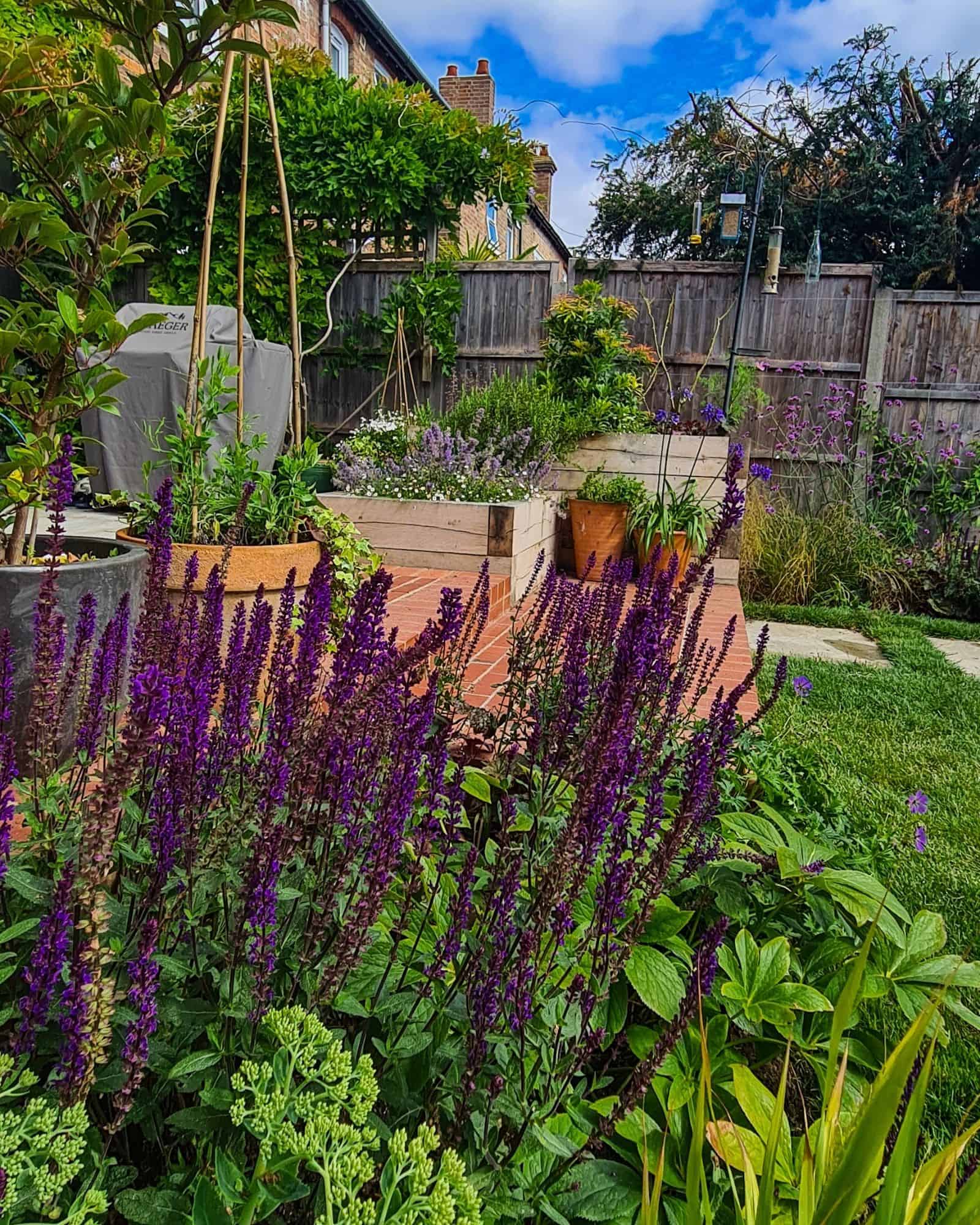 English country garden design brick walls and seating 