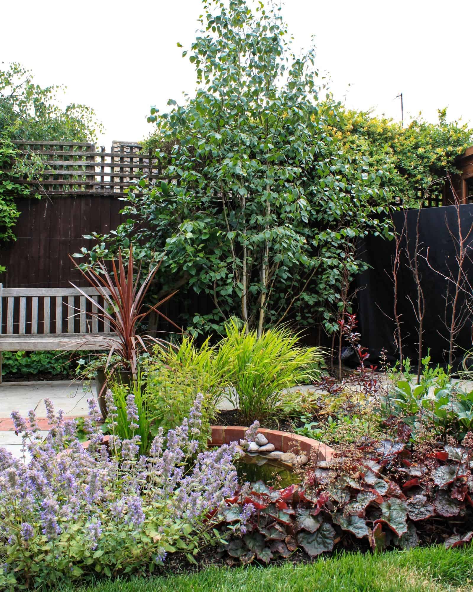 English country garden design brick walls and seating 