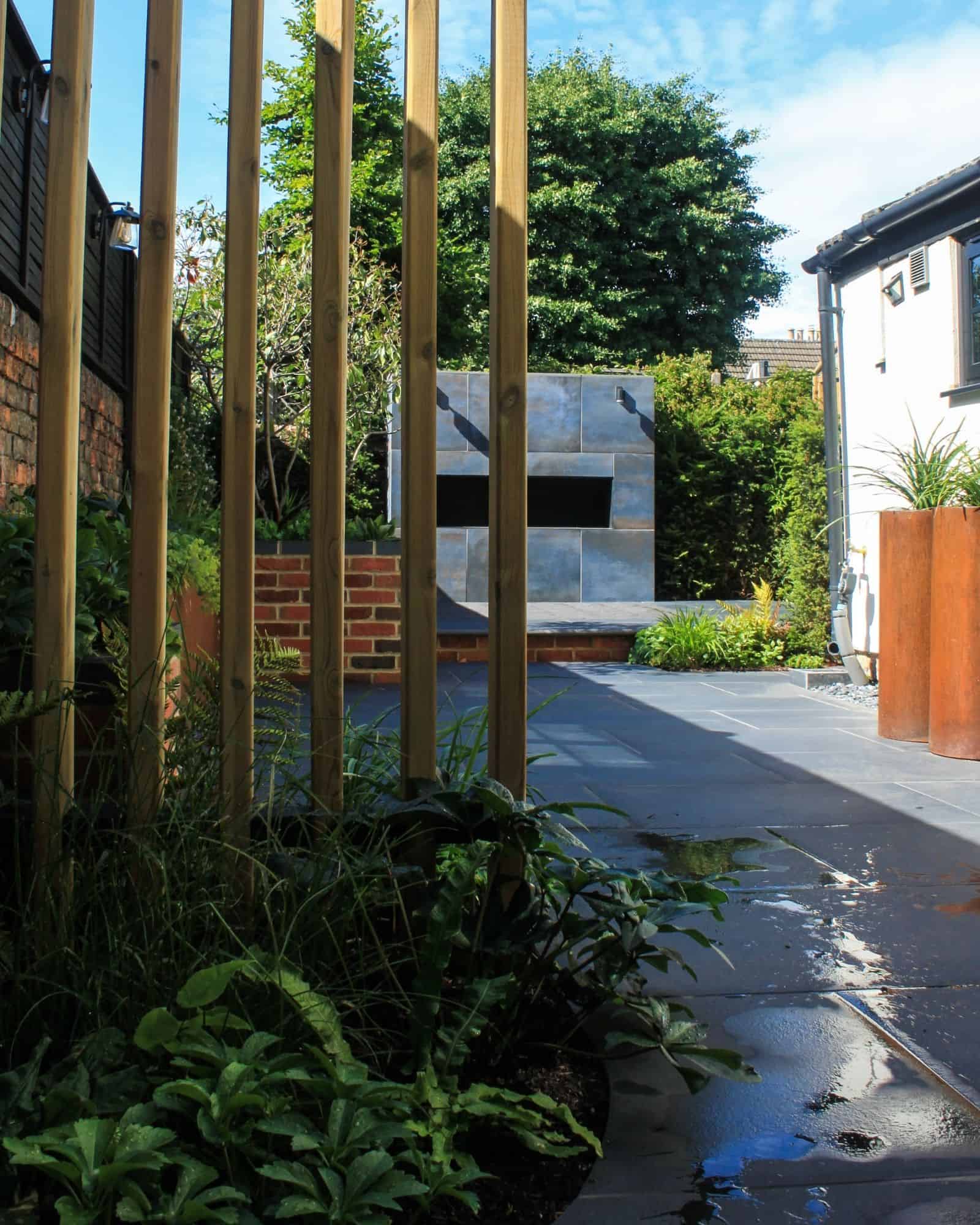 English country garden design brick walls and seating
