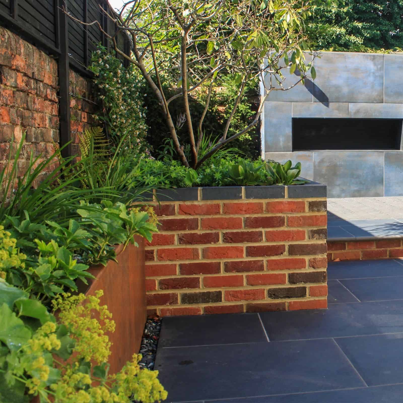 planting at base of a wall Garden Design Buckinghamshire