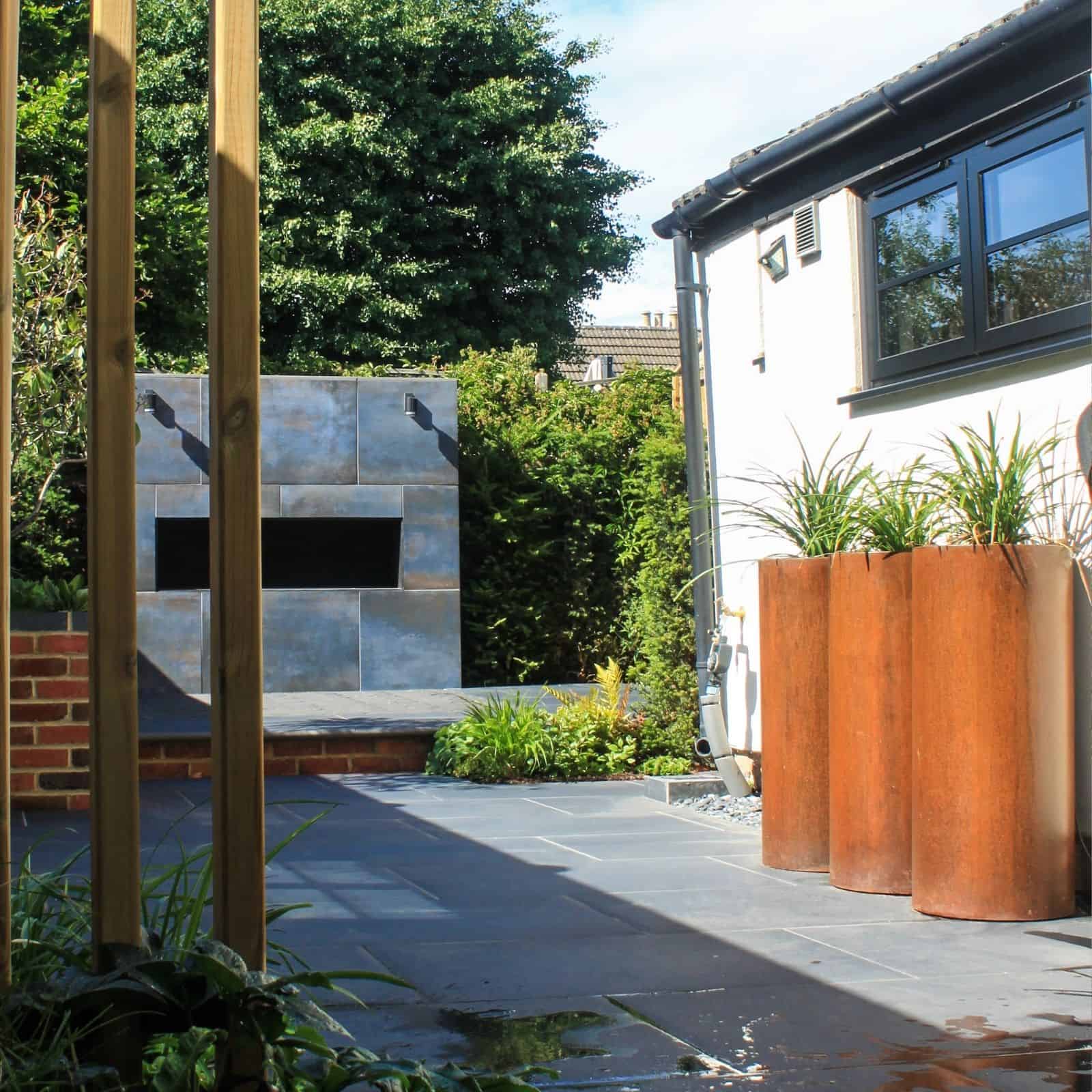 English country garden design brick walls and seating